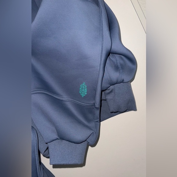 FP MOVEMENT FREE PEOPLE OFF TO THE RACES SKYLINE BLUE BOMBER JACKET LARGE NWOT - Picture 6 of 14